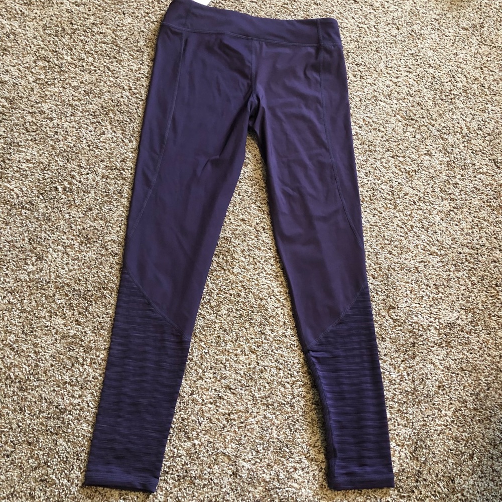 Purple athleisure wear or workout leggings